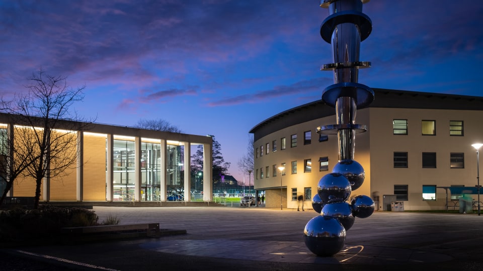 Night view of Shirley Pearce Square and NCSEM building